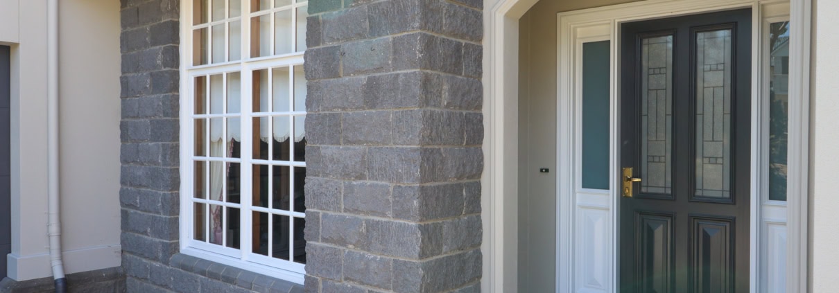 Detailed exterior painting of a front entry by Shore Finish